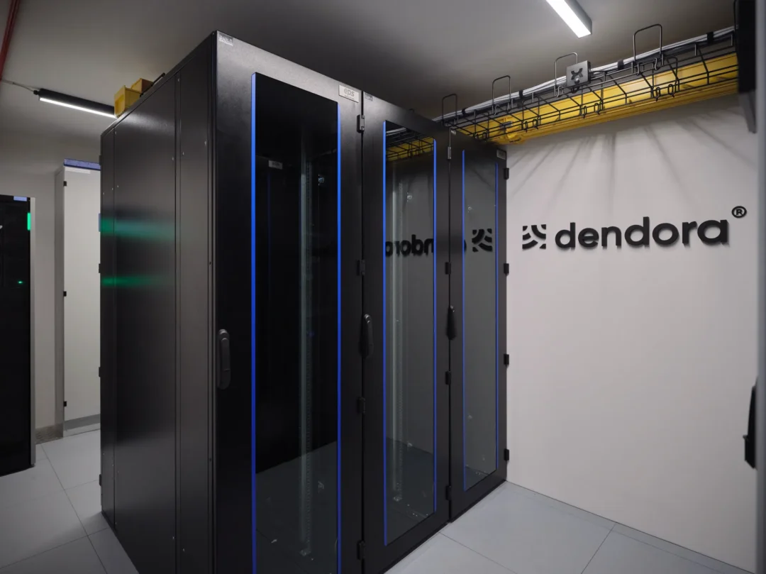 Dendora server room with dendora logo in the background