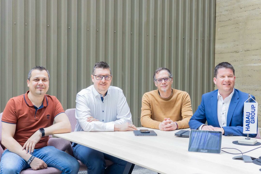 Paul Muehlbächler, IT Services at HABAU GROUP, Gerald Froschauer, IT Manager at HABAU GROUP, Claus Hofer, Deputy Head of IT at HABAU GROUP, and Peter Reisinger, Managing Director of EPS Electric Power Systems GmbH, in conversation.